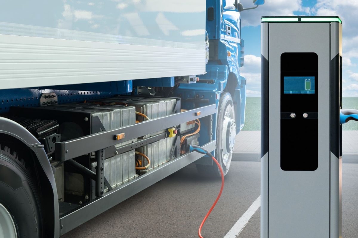 Electric truck batteries are charged from the charging station. Concept