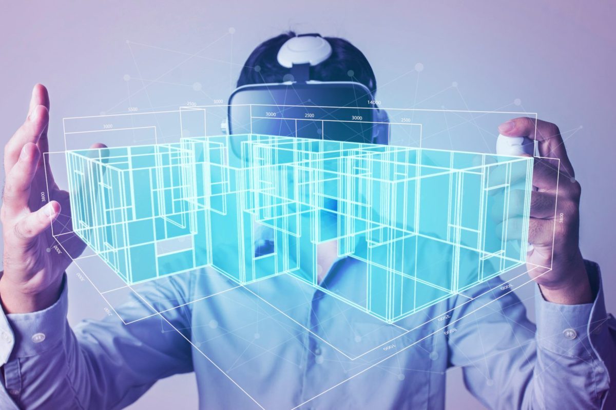 Architect or Engineer designer wearing VR headset for BIM technology working design 3D house model.