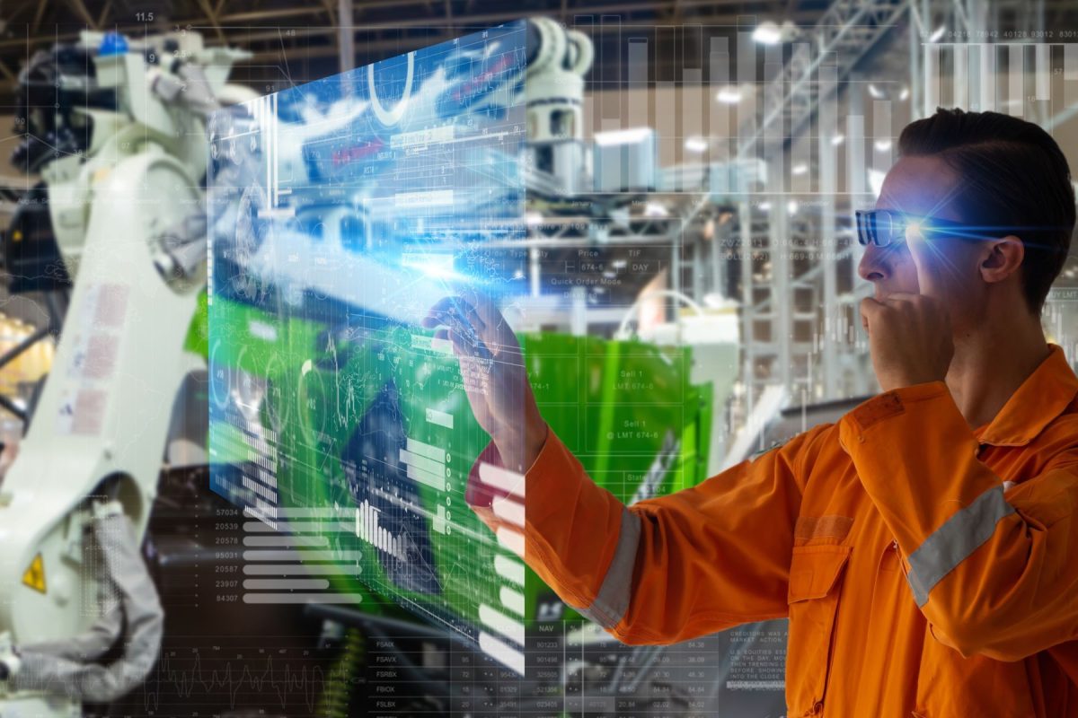 smart factory which use futuristic technology which combine big data, iot, 5g, machine deep learning, automation robot, augmented mixed virtual reality, digital twin, artificial intelligence
